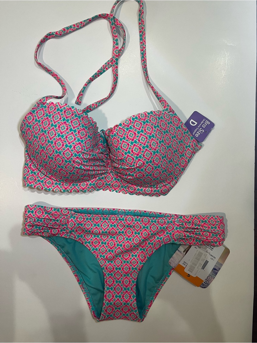 Coco Rave bikini, top is size 34D and bottoms is Small. NWT.